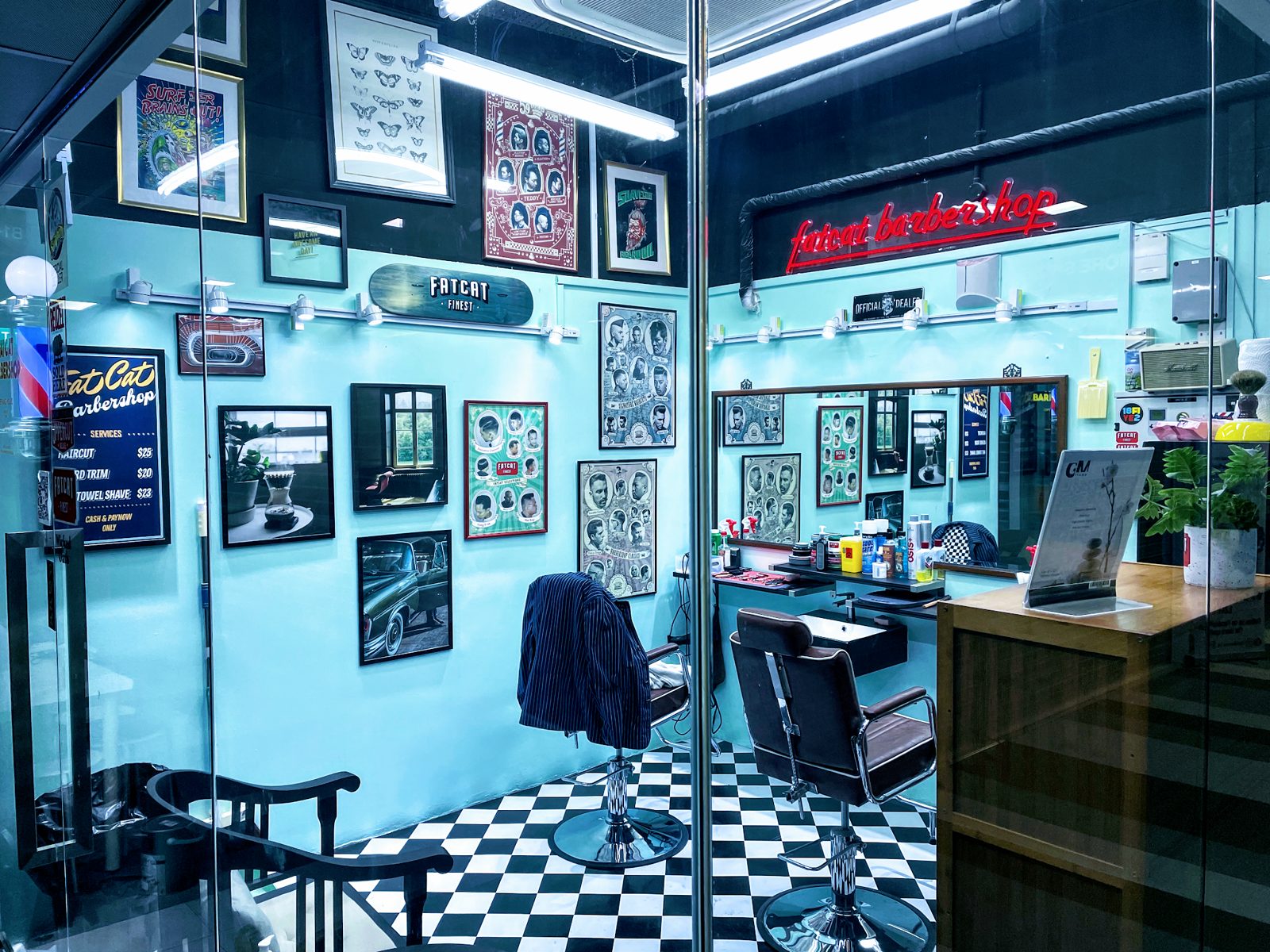 The shop interior with neon sign and checkerboard floor